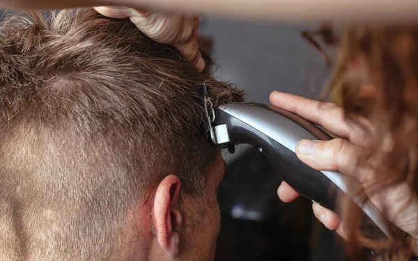 depositphotos 574617372 stock photo cutting hair trimmer hairdresser shaves